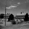 <p>Buildings 101 and 102, two of the two-family houses (duplexes) for NCOs, view northeast, 1958.</p>